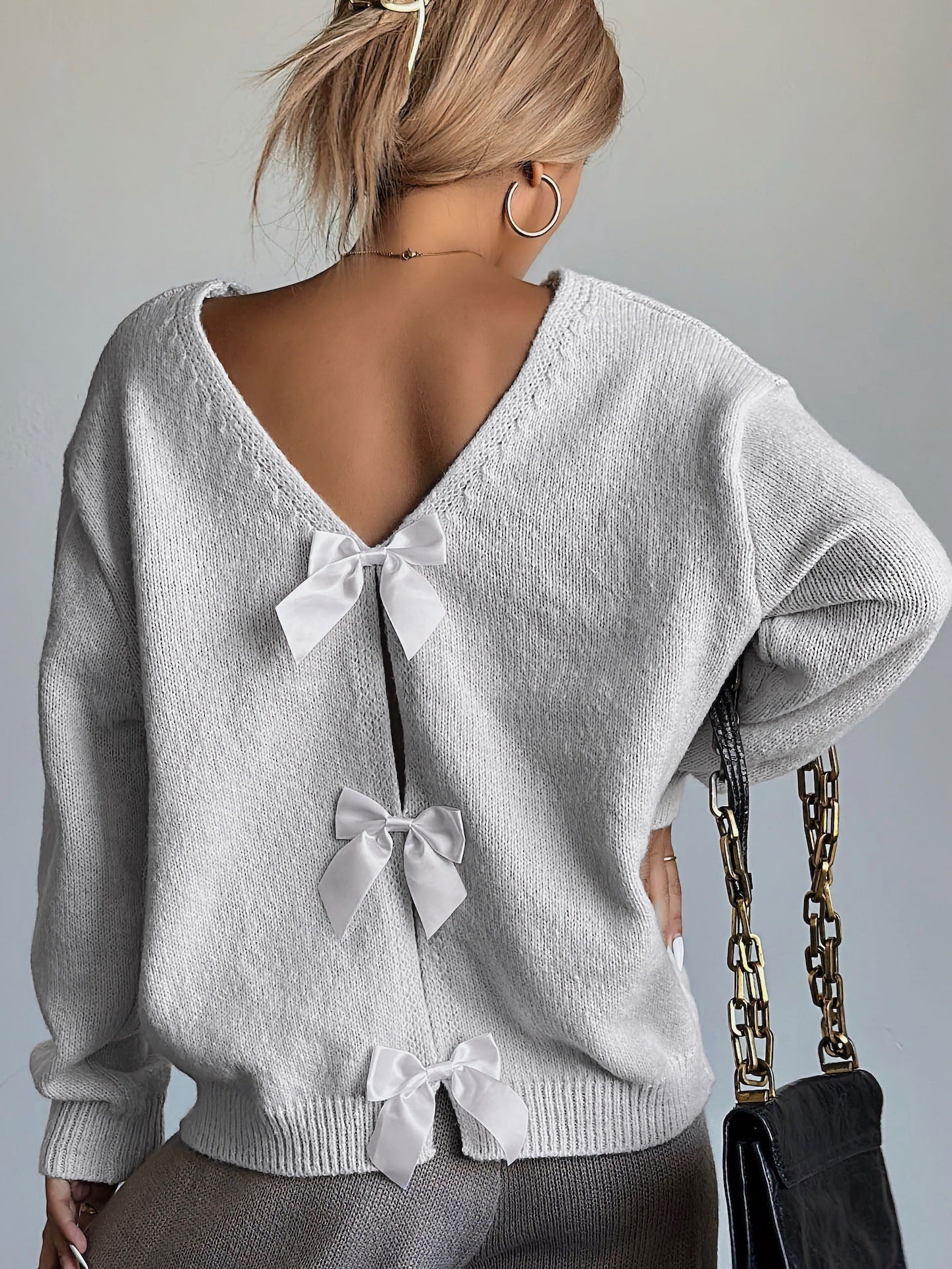 Women's sweater with back cutout
