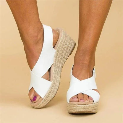 Wedge sandals with woven sole