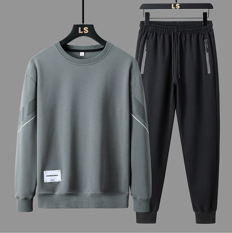 Modern Men's Casual Tracksuit Set With Relaxed Fit And Subtle Line Detailing For Everyday Athleisure