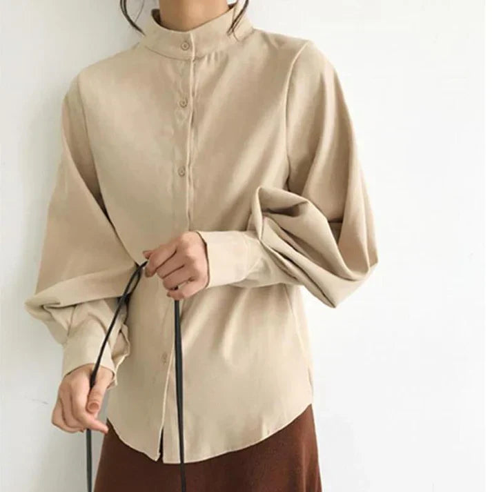Eloura-Moda | Classic blouse with turtleneck and balloon sleeves