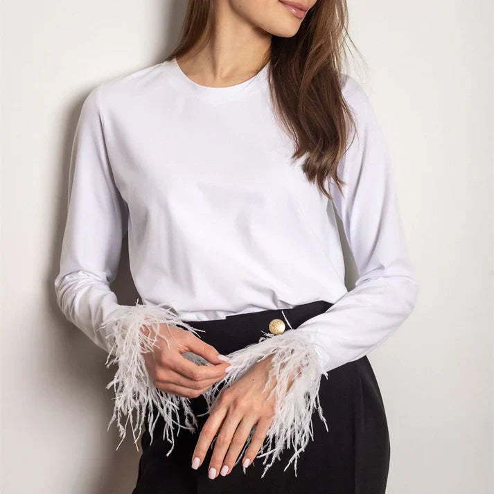 Eloura-Moda | Long sleeve top with feathers